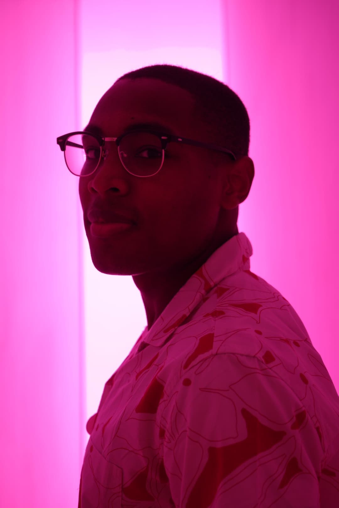 Creative portrait with neon-accented lighting